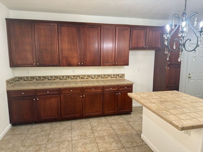 Building Photo - NICE 2-STORY CONDO 3 BED, 2.5 BATH, & 2 CAR GARAGE NEAR SHOPPING & HWY 50!