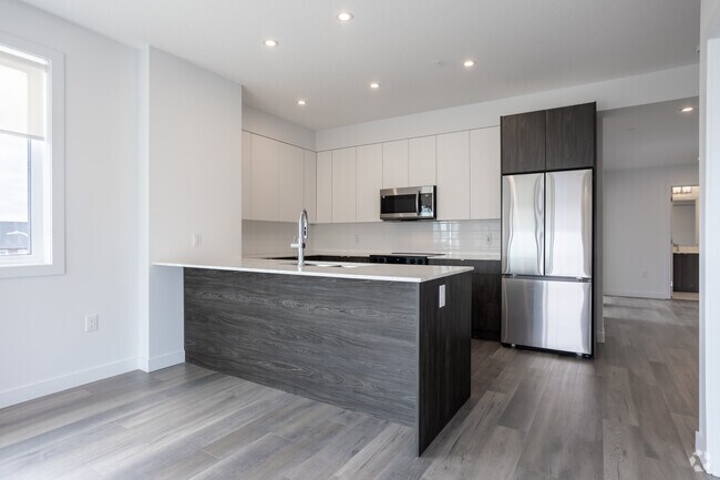 3 chambres, 2 salles de bain - 1034 pi2 - Cuisine - Heritage Flats