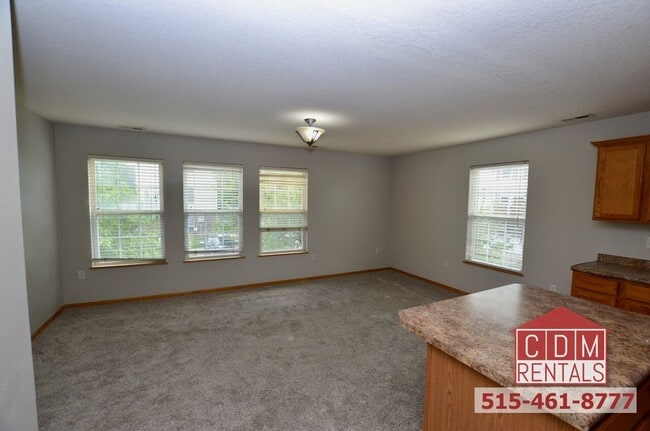 Building Photo - Wonderful Waukee Townhome