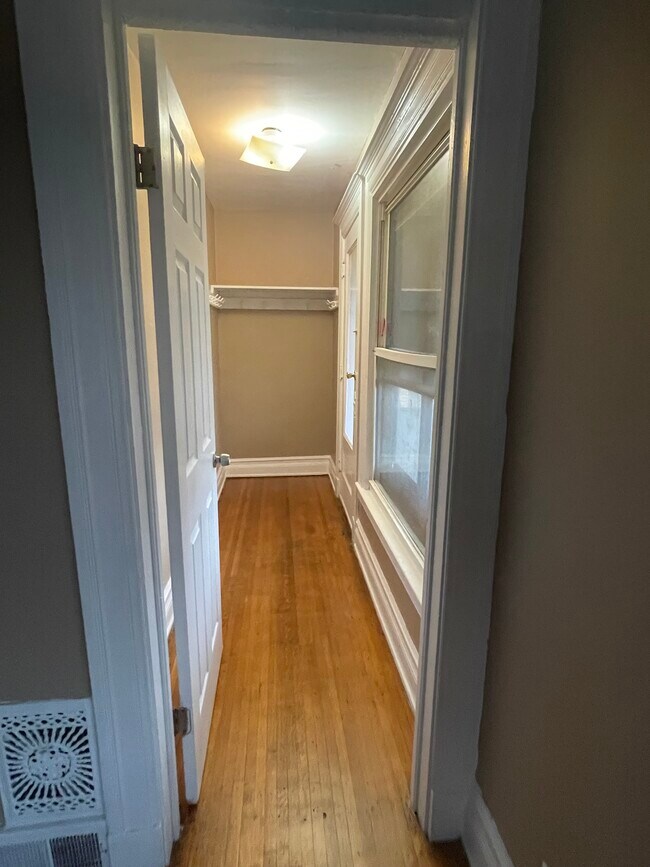 Storage area with door to covered porch - 26 Avenue A