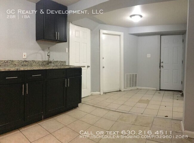 Building Photo - 6707 S Langley Ave