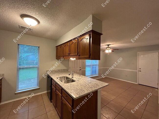 Building Photo - 6572 Rosewood Dr