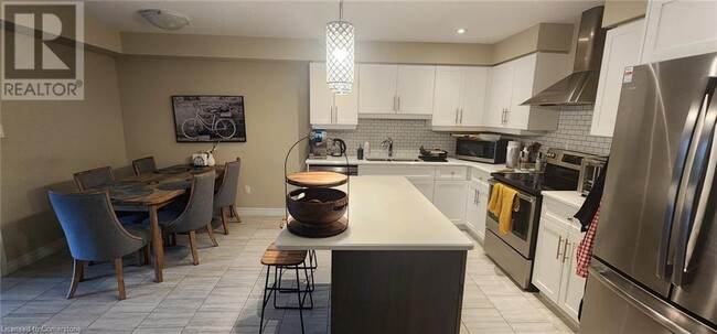 Photo du bâtiment - 1220 Riverbend Rd