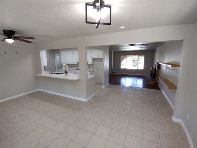 View from dinning room, looking toward kitchen and forma living room - 909 Galopago St