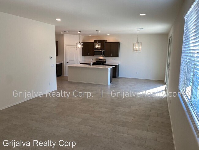 Building Photo - 4 br, 3 bath House - 10677 W Harrigan Drive