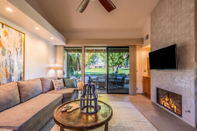 LIVING ROOM WITH VAULTED CEILINGS &FIREPLACE - 334 S Sierra Madre