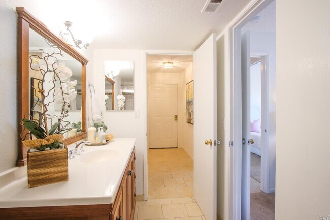 Entry hall taken from bathroom - 15 Hector Ln