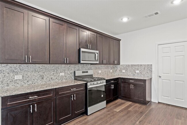 Foto del edificio - 7322 Madison Cmns Ln