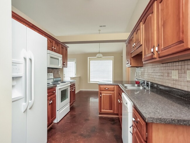 Foto del edificio - 5408 Hidden Meadows Dr