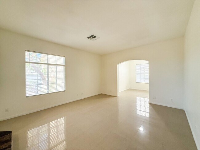 Building Photo - SPACIOUS HOME IN GATED COMMUNITY WITH POOL, RV PARKING & 4-CAR GARAGE!