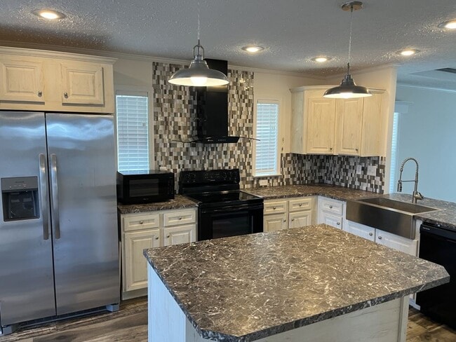 Foto del edificio - 3113 Wiley Ave