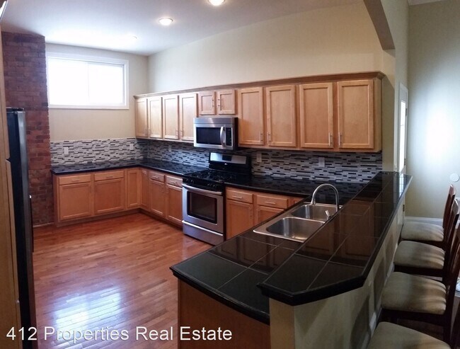 Foto del edificio - 4 br, 2 bath House - 151 Pius Street