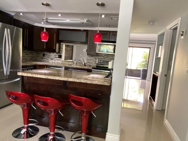 Building Photo - 3282 N Pine Island Rd