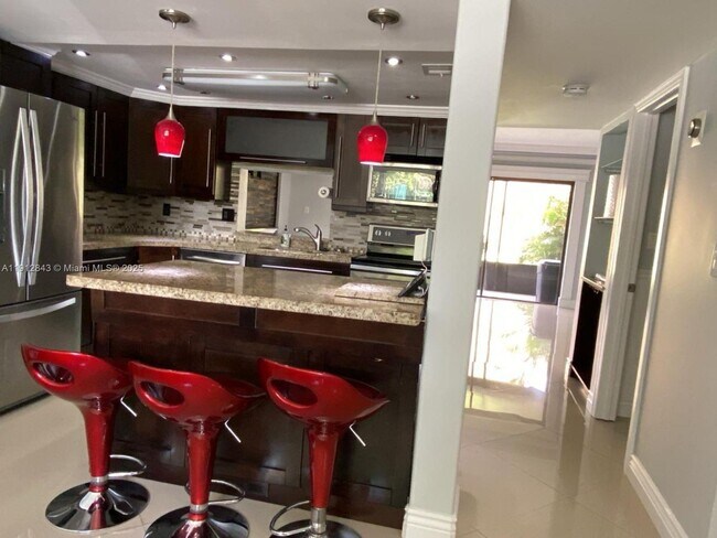 Foto del edificio - 3282 N Pine Island Rd