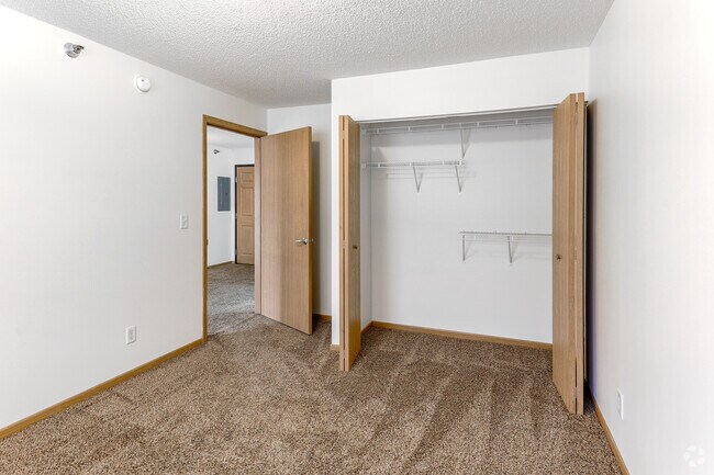2BR, 1BA - 885SF - Primary Bedroom - Meadow Creek Village