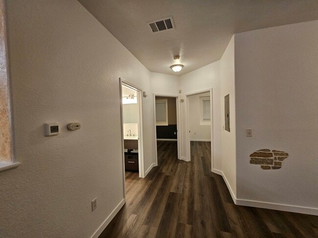 Bedrooms and spare bathroom - 3282 E 103rd Dr