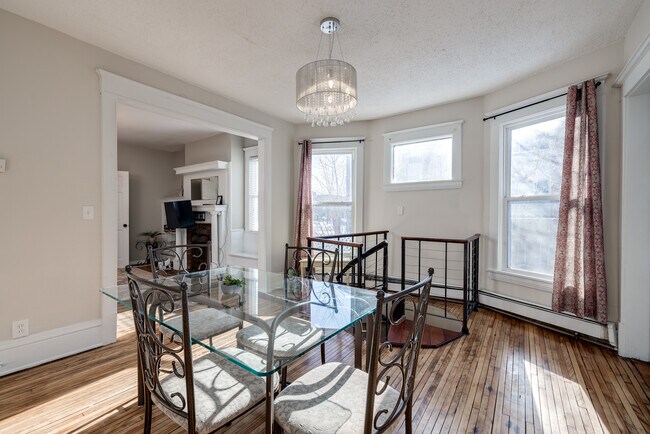 View of dining room, with spiral staircase leading to garden level - 2720 Blaisdell Ave