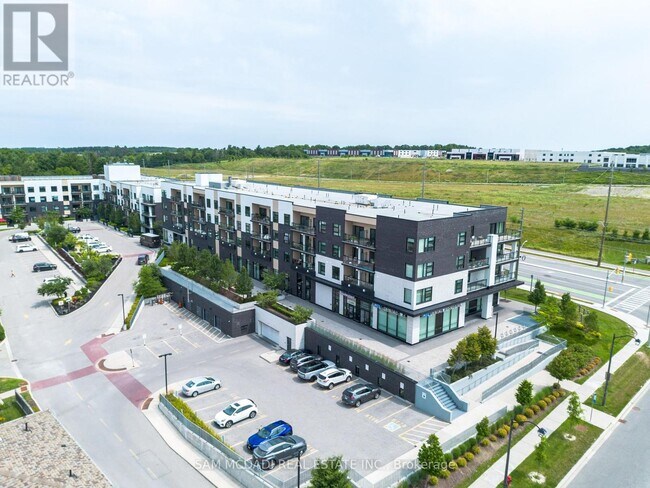 Photo du bâtiment - 555-555 William Graham Dr