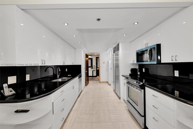 Building Photo - 10175 Collins Ave