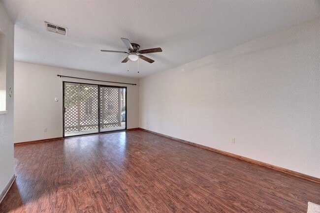 Building Photo - 10 Cypress Fairway Village