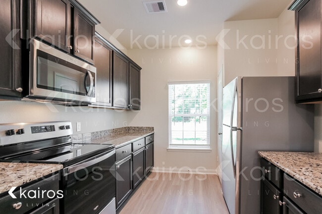 Foto del edificio - 10730 Hillside Creek Dr