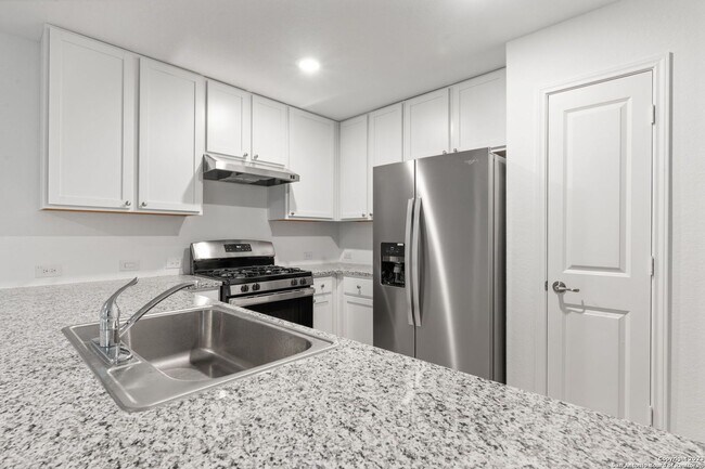 Building Photo - This beautiful single-story home has 4 bedrooms, 2 baths, vinyl flooring throughout, an open floo...