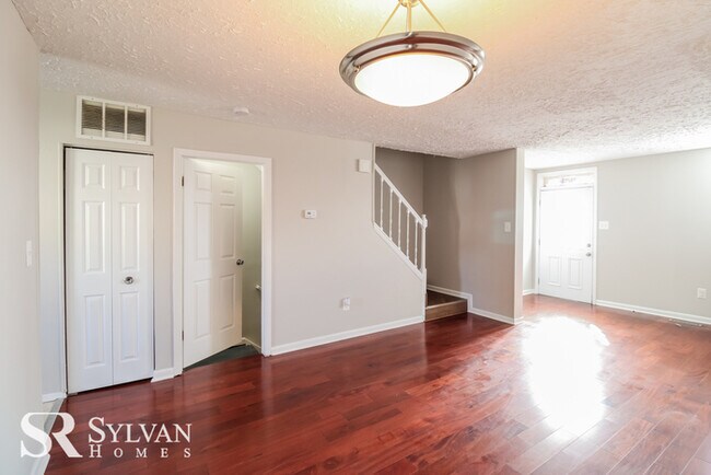 Building Photo - Fall in love with this beautiful brick tow...