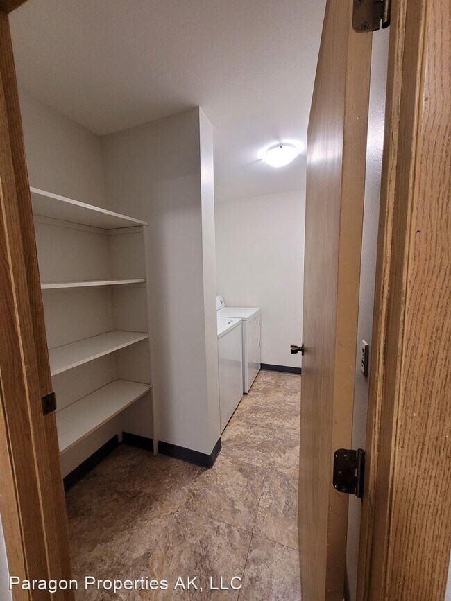 Building Photo - 2 br, 1 bath House - 3550 W. Dimond Blvd #203