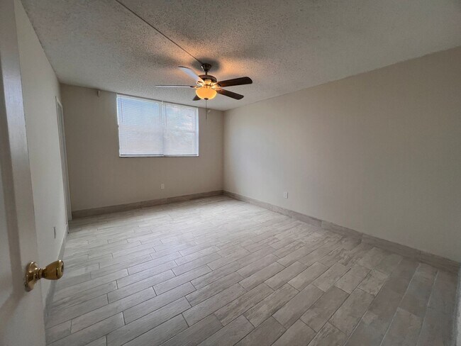 Photo - Great unit with pool view, pretty tile flooring. Apartment