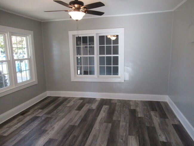 Building Photo - Check out this beautifully renovated white...