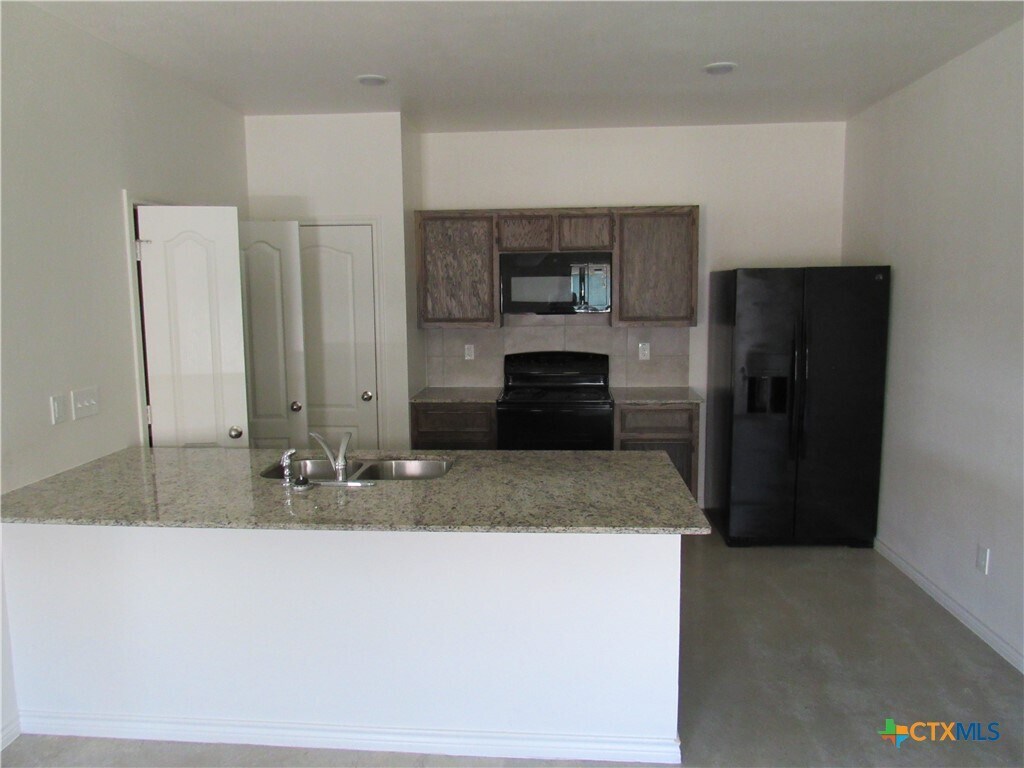Foto principal - 6102 Harriet Tubman Ave
