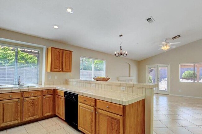 Building Photo - Delightful one-story abode nestled in the ...