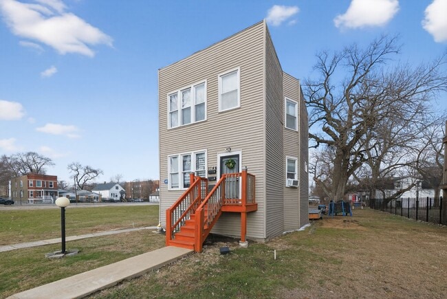 Building Photo - 1144 W 68th St