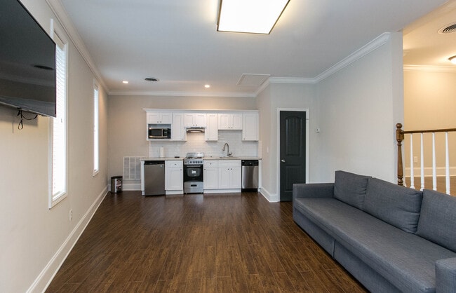 Large Screen TV - The Residence at 1743 N Decatur
