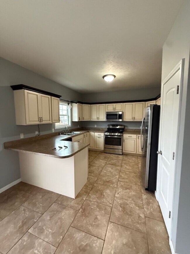 Foto del edificio - 404 Dalhlia Dr