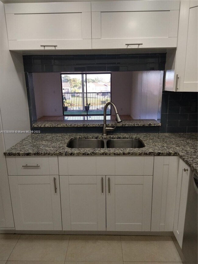 Building Photo - 6575 W Oakland Park Blvd