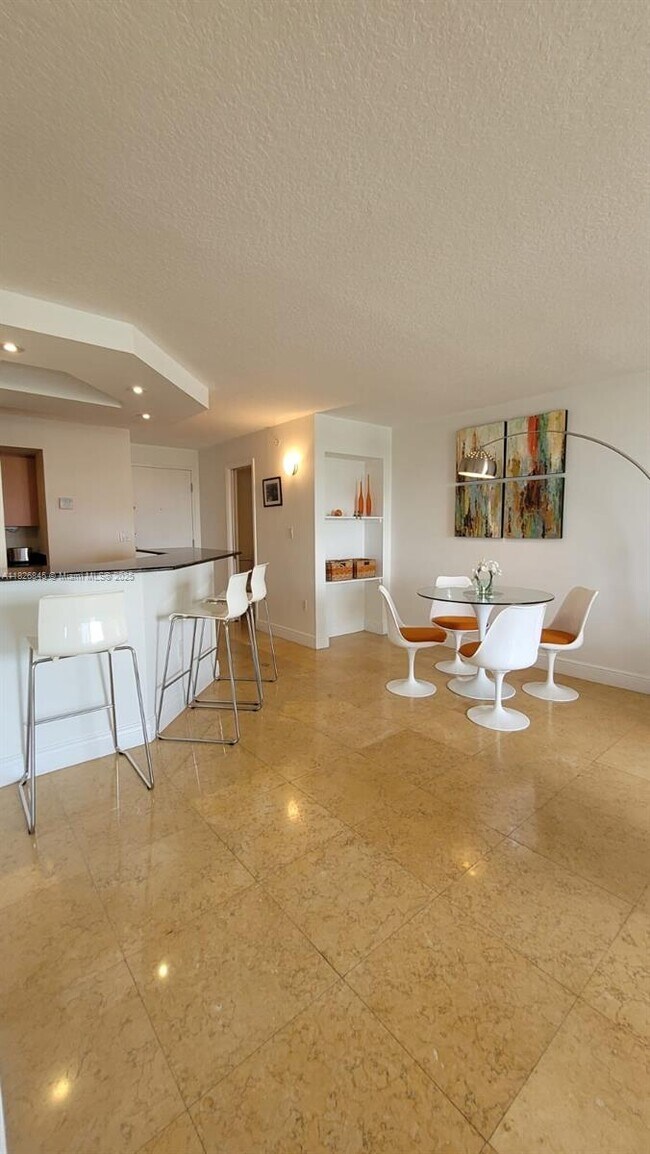 Building Photo - 6917 Collins Ave