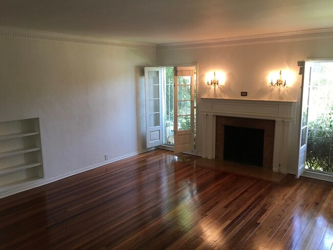 Living Room with working wood/gas fireplace - 5211 W 9th St