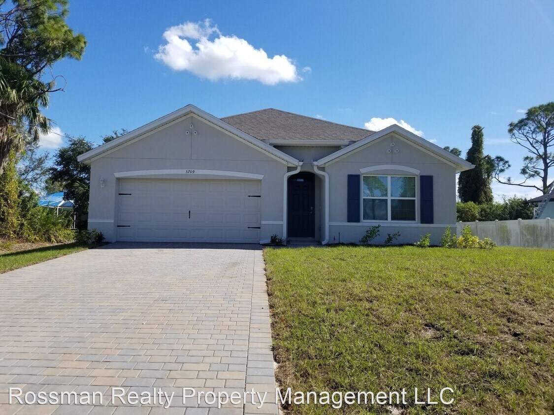 Foto principal - 4 br, 2 bath House - 3709 NE 15th Ave