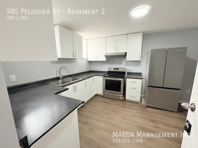 Building Photo - CHARMING 2 BEDROOM, 1 BATHROOM BASEMENT FL...