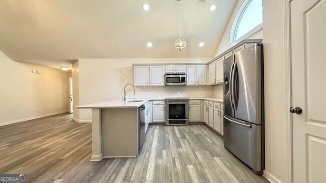 Foto del edificio - 6423 Grand Hickory Dr