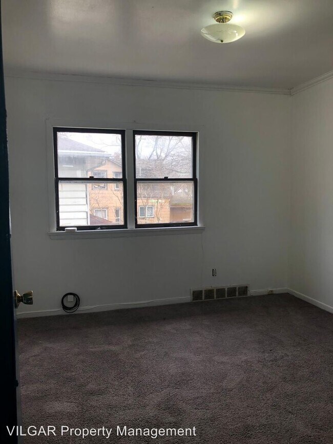 Foto del edificio - 6009 E 6th Pl