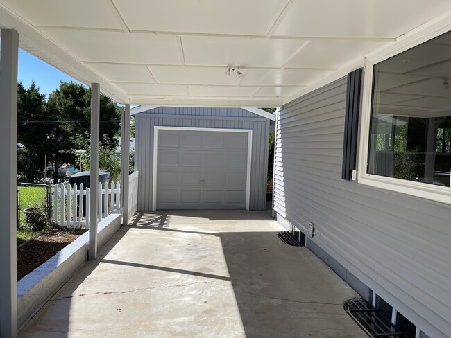 Front carport and garage - 1853 S Fairfax St