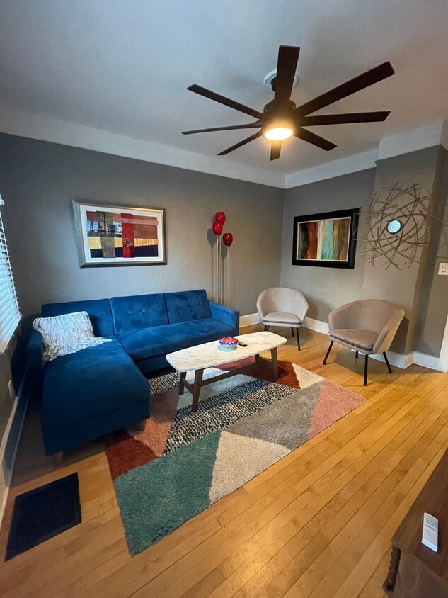 Living room with large flat screen tv - 1506 N Jefferson St