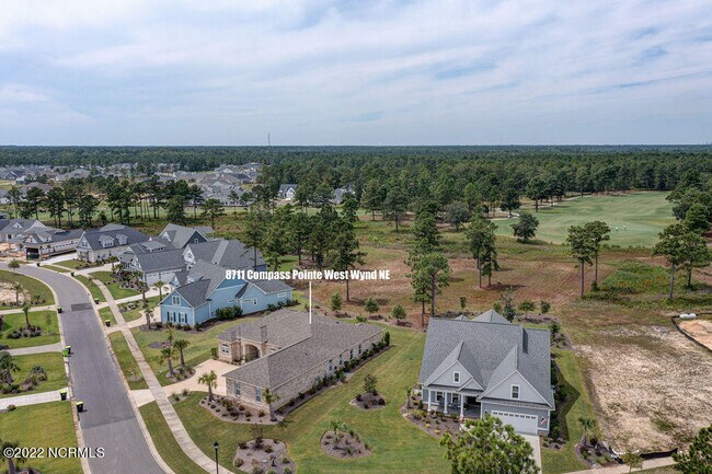 Foto del edificio - 8711 Compass Pointe West Wynd NE