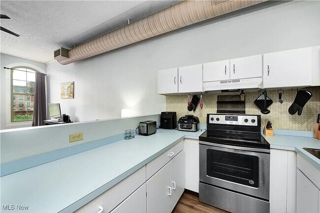 Building Photo - Charming 1BR Condo in Cleveland downtown w...