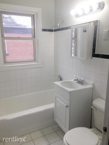 Building Photo - 2 br, 1 bath Apartment - 7646 S Jeffery Ave
