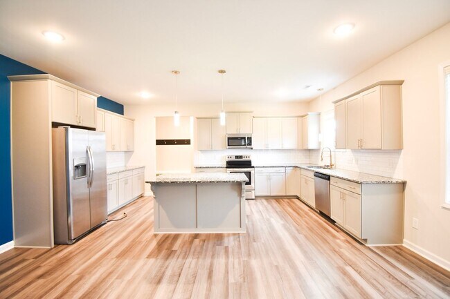 Building Photo - Coming Soon: 4 Bedroom 2.5 Bathroom Small Pets