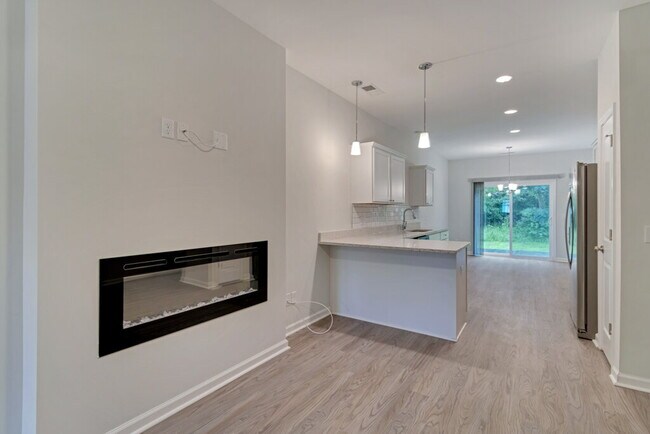 Foto del edificio - Conveniently located 3 bedroom, 2.5 bathroom townhome in The Commons subdivision