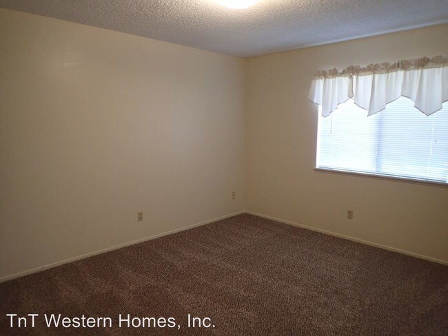 Building Photo - 1009 W Atkins Ave